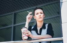 Woman smoking at work