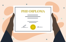 Hands holding a PhD doctorate certificate